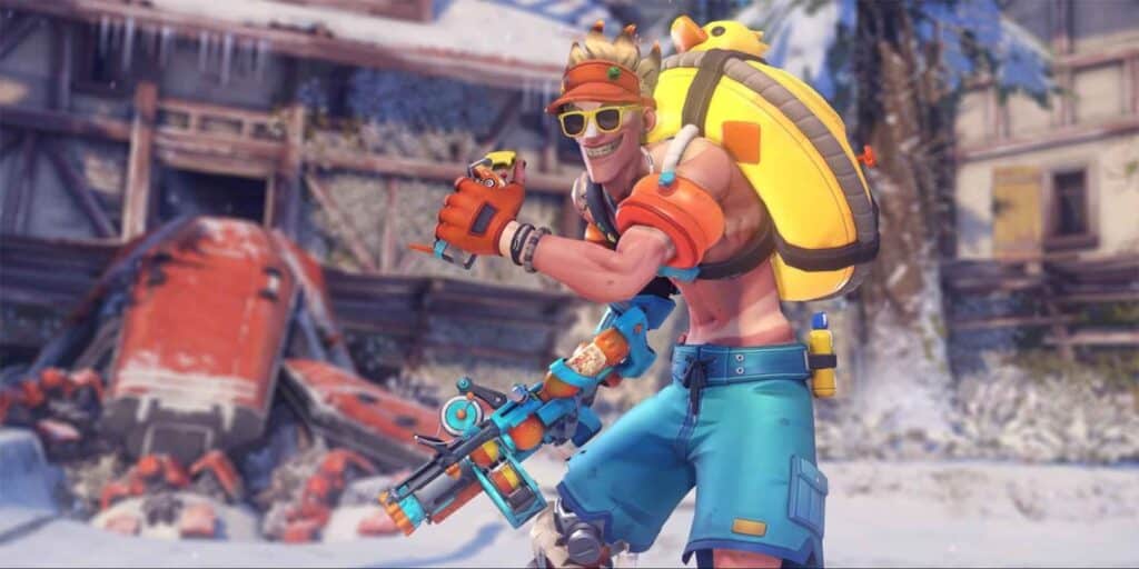 A cheerful character from Overwatch 2 in summer attire with sunglasses and a yellow inflatable duck backpack holds a toy blaster. Snowy background with a red structure.