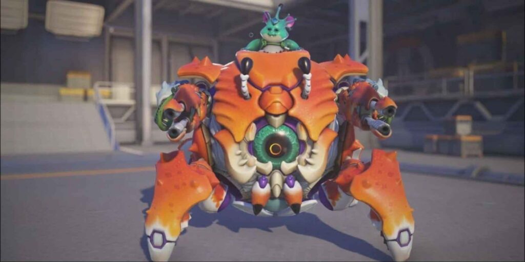 A vibrant, robotic Hammond in crab skin with six legs and a central eye, featuring a green, playful creature perched on top.