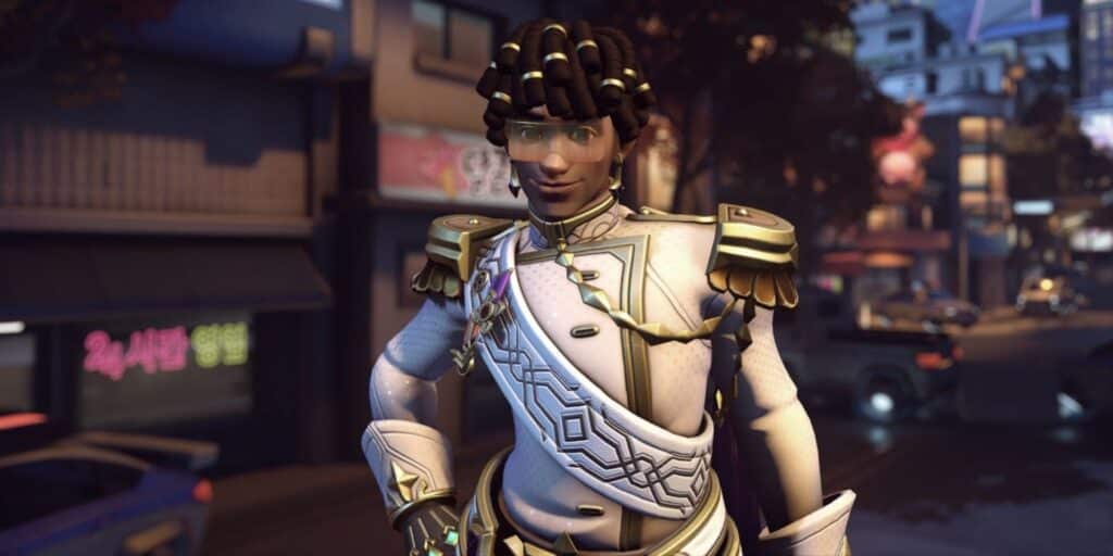 Lucio in ornate suit stands confidently in a vibrant cityscape, illuminated by neon signs