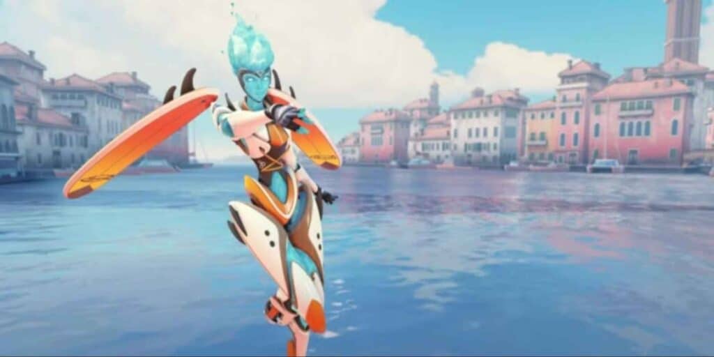 A futuristic Overwatch 2 character in sleek armor stands joyfully by a serene waterfront, with colorful buildings lining the canal under a blue sky.