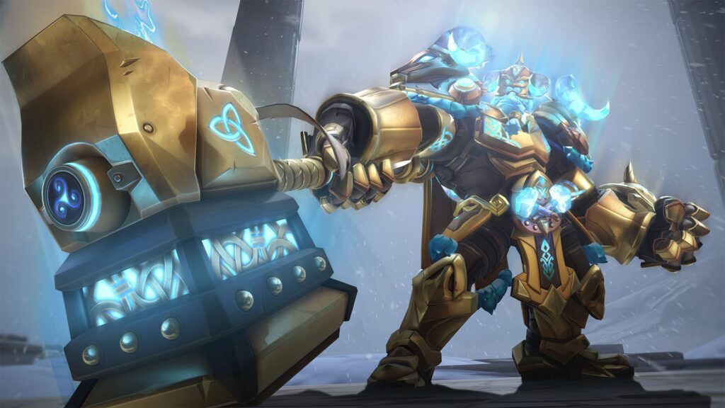 Thor Reinhardt in gold armor wields a glowing hammer, standing in a snowy landscape