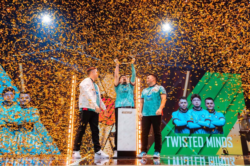 Image of Twisted Minds Warzone roster celebrating win on stage at Esports World Cup