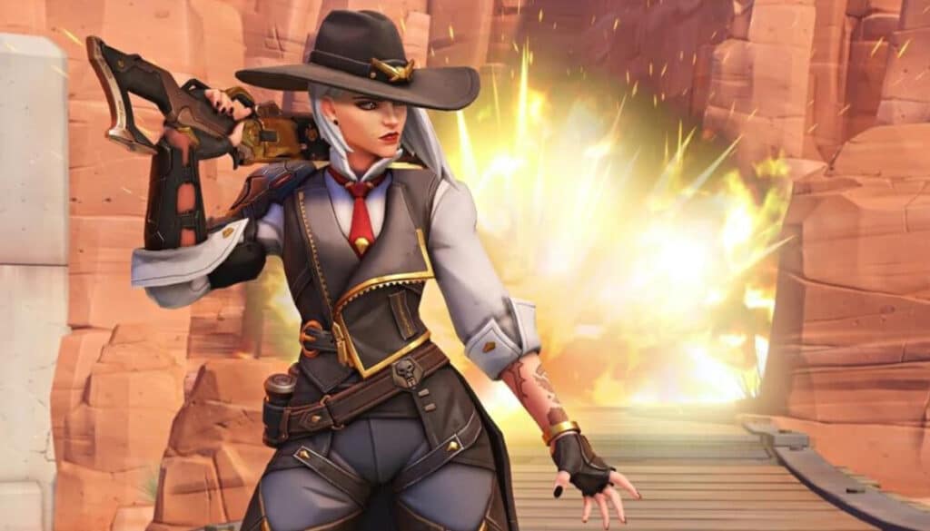 Ashe in stylish attire poses confidently with a shotgun in hand against a backdrop of a dramatic explosion and rocky landscape